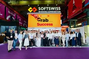 Equipo SOFTSWISS con Grab Success