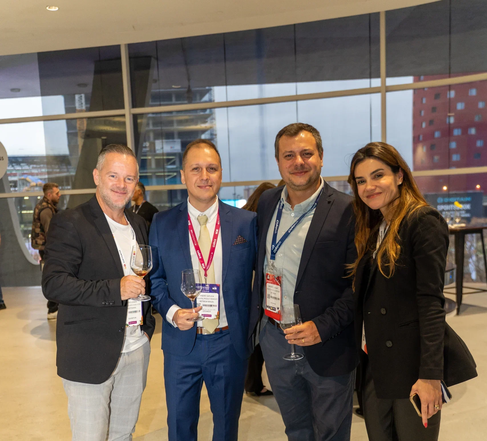 four people standing